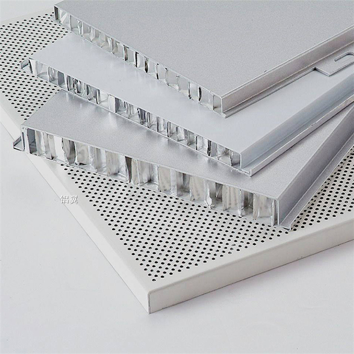 1635080178200111.jpg 穿孔鋁蜂窩板.jpg